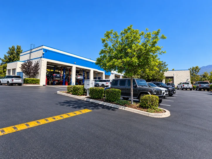 Customer parking and repair facility at Super Service of Pomona Valley